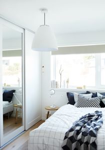 Bedroom with Langlo® Topaz sliding wardrobe wooden door in pure white and clear mirror finish (thumbnail)